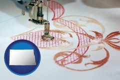 north-dakota map icon and machine embroidery